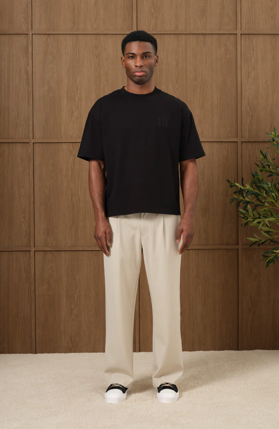 Embossed Monogram Back Logo T-shirt in Black - Happy Cabbage London